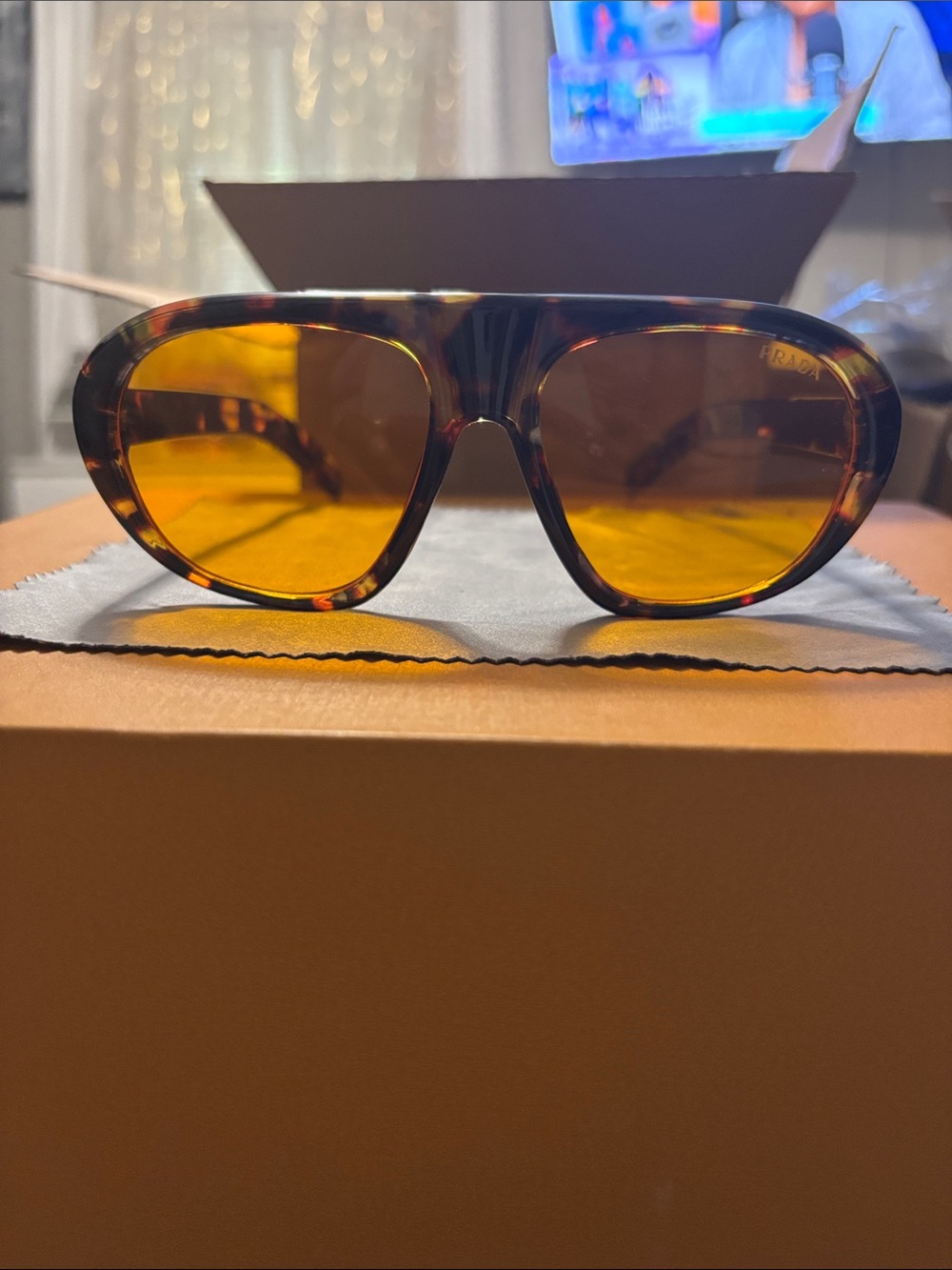 Prada Tortoiseshell Frame Sunglasses with Amber Lenses